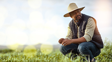 Image showing Farmer, black man and mockup for agriculture and sustainability outdoor on an agro farm with bokeh. Person on grass field thinking about farming innovation, growth and ecology in the countryside