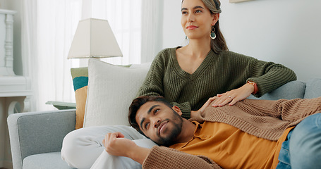 Image showing Relax, love and watching tv with couple on sofa for movie, streaming or television subscription. Happy, smile and peace with man on woman legs in living room at home for video, news or film together