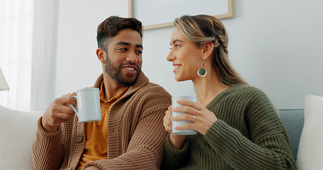 Image showing Movie, coffee and couple watching tv or streaming an online series via a subscription for fun entertainment at home. Relaxing, smile and happy woman enjoying a film together on a sofa with partner