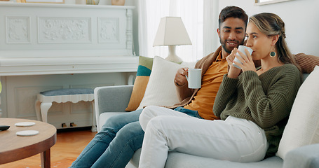 Image showing Relax, coffee and watching tv with couple on sofa together for movie, streaming service or television. Happy, love and tea with man and woman in living room at home for video, film and news lifestyle