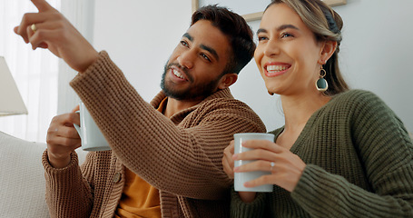 Image showing Movie, coffee and couple watching tv or streaming an online series via a subscription for fun entertainment at home. Relaxing, smile and happy woman enjoying a film together on a sofa with partner