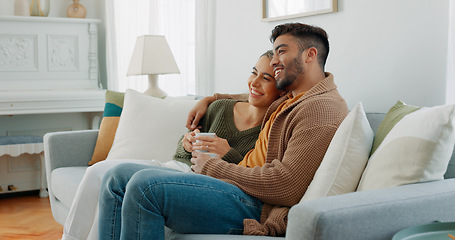 Image showing Relax, coffee and watching tv with couple on sofa together for movie, streaming service or television. Happy, love and tea with man and woman in living room at home for video, film and news lifestyle