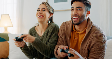 Image showing Video game, fun and excited diversity couple with crazy high energy, play together and enjoy quality bonding time at home. Entertainment technology, controller and competition for happy woman and man