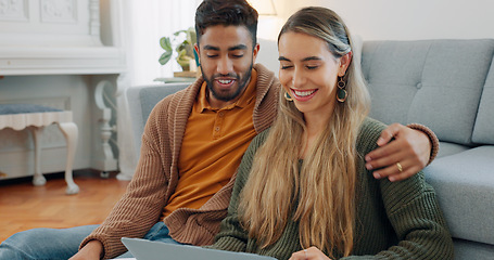 Image showing Interracial couple, laptop and love being happy together, relationship and enjoy romance for planning date, talking and on floor home. Romantic, man and woman for bonding, embrace and relax with hug.