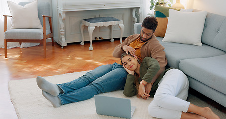 Image showing Couple, watching film on laptop and love, together and talking, bonding and streaming online, technology and care at house. Young man, woman and happy, talking and relax, spending quality time.