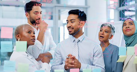 Image showing Meeting, collaboration and sticky notes with a business man training a team while planning strategy on glass in an office. Teamwork, diversity and workshop with a man and woman employee group at work