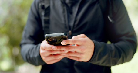 Image showing Man, hands and phone for hiking gps, location or map in Australian forest, nature woods or sustainability environment. Zoom, hiker and backpacking person on mobile technology for fitness training app