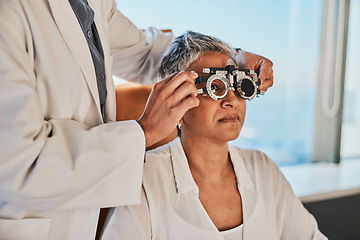 Image showing Senior eye exam, optometrist and medical eyes test of elderly woman at doctor consultation. Vision, healthcare focus and old female patient with consulting wellness expert for lens and glasses check