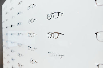 Image showing Glasses, frame choice and retail sale in a healthcare, eye wellness and wellness store with no people. Shop stock, eyewear and consumer products on a display stand for shopping and buying in market