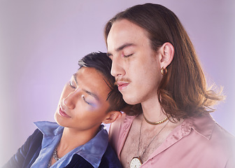 Image showing Cyberpunk, tired and gay couple sleeping in makeup isolated on a pink background in studio. Futuristic, lgbt freedom and men friends napping for fatigue, love and together on a bokeh backdrop