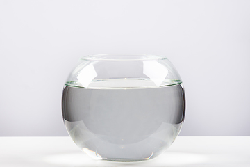 Image showing Round aquarium filled with clean water on a white background