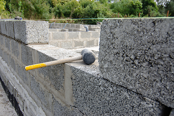 Image showing Construction of walls from expanded clay concrete blocks