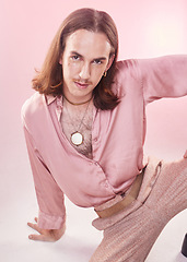 Image showing Portrait, vintage fashion and lgbt man from Ukraine with confidence isolated on pink background. Happy, aesthetic and male model with beauty in studio, creative non binary and gender neutral design.