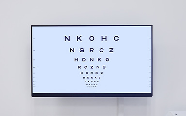 Image showing Eye chart, television and screen in hospital for optometry examination, vision and wellness. Healthcare, eyecare tv and technology with snellen chart for eyesight test, ophthalmology and eyes health