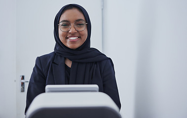 Image showing Optometry, smile and portrait of a Muslim woman with a machine for a vision test and eye care check. Ophthalmology, service and Islamic optician smiling with equipment for a lens checkup at clinic