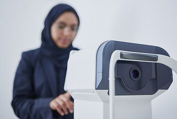 Image showing Optometry, ophthalmology and Muslim woman with a machine for vision correction and surgery. Test, technology and optician with device for examination of eyes, optical measurement and visual exam