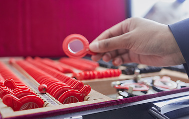 Image showing Trial lens, optometry and vision test, ophthalmologist hand and tools, eye care and frame with health. Glasses, healthcare for eyes and person in clinic with exam equipment and expert with eyewear