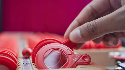 Image showing Optometry, hands and trial lenses for a eye test for vision, eyecare and healthcare in a optic clinic. Eyewear, glasses and optician or ophthalmologist choosing a prescription lens in a optical store