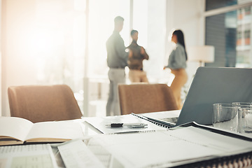 Image showing Desk, paperwork and notebook with laptop in office, professional workspace and setup, folder and planning. Strategy, documents and research, busy with business proposal with meeting and information