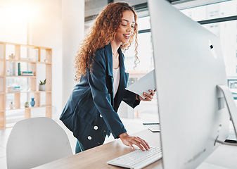 Image showing Young entrepreneur, typing and black woman with computer, startup office and communication on web app. Tech business owner, keyboard and documents with planning, contact and networking on internet