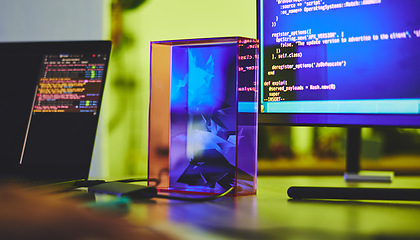 Image showing Computer screen, code and desk with programming, technology abstract with web design or cyber security with laptop. Coding, IT and software update, neon and prism with safety against malware and ux