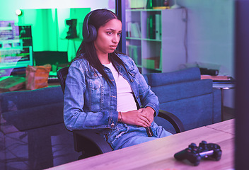 Image showing Woman, headphones or gaming loss in neon home with bored, tired or annoyed face expression in PC esports challenge. Video gamer, console or loser in night house basement with fail, mistake or burnout