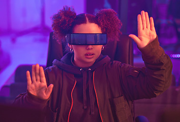Image showing Virtual reality glasses, hands and black woman in metaverse for futuristic gaming in purple room. Gamer person with ar tech for 3d, vr and cyber world experience streaming online digital fantasy game