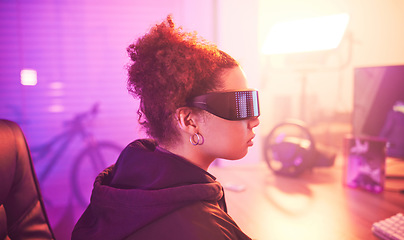 Image showing Metaverse, virtual reality glasses and woman gamer for futuristic gaming in purple room. Cyberpunk person with ar tech for 3d, vr and cyber world experience streaming online digital fantasy game