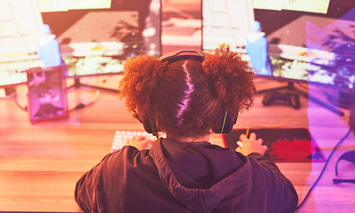 Image showing Back of girl, streamer and video game on computer in home, desk or online games of virtual competition. Female gamer, live streaming and gaming with headphones in neon lighting, esports tech or gen z