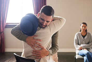 Image showing Support by woman hug a crying man for comfort, grief and care after bad news or problems in a home or house. Cancer, sad and depression by people hugging for empathy, love and hope together
