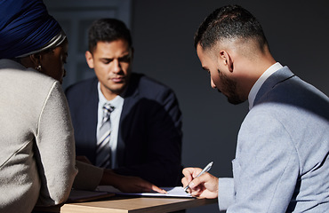 Image showing Business people, law firm and signing contract agreement, policy or form in development process on table. Male attorney or corporate lawyer filling application for b2b, collaboration or partnership