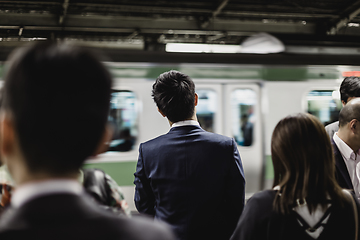 Image showing Passengers traveling by Tokyo metro.