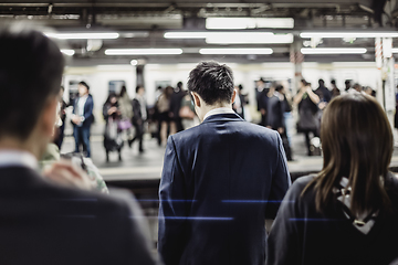 Image showing Passengers traveling by Tokyo metro.