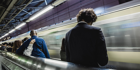 Image showing Passengers traveling by Tokyo metro.