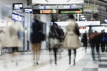 Image showing Business people traveling by Tokyo metro.