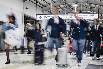 Image showing Business people traveling by Tokyo metro.