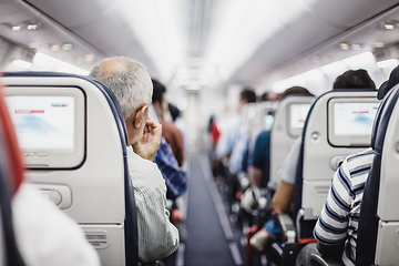 Image showing Passengers on the airplane.