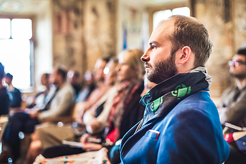 Image showing Entrepreneur in audience at business conference.