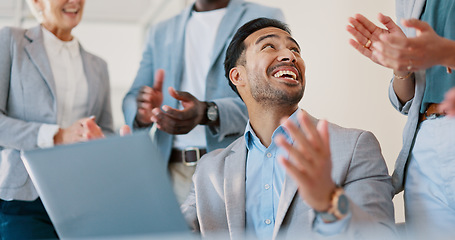 Image showing Business people, celebration and applause for man on laptop in office. Success, congratulations and group of staff clapping to celebrate goals, targets or achievements with happy employee on computer