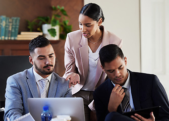 Image showing Business meeting, consulting and collaboration on laptop with teamwork for legal strategy in an advocate office. Lawyer group with tech in a brainstorming, planning with innovation for court case or