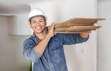 Image showing Construction worker, home renovation and portrait of man holding wood for maintenance. Working, smile and house development project employee and builder or handyman for architecture or industrial job