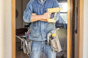 Image showing Man, DIY and drill for construction, building or home repair, renovation and improvement. Equipment, handyman and male ready for maintenance, architecture or house design project as a professional