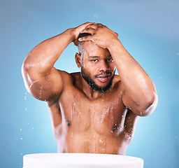 Image showing Water, portrait or black man cleaning face or body for skincare, fresh clean hygiene on studio background. African male model in beauty or wellness washing, grooming or cleansing for facial treatment