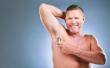 Image showing Man, portrait smile and shaving armpit in skincare hygiene or grooming against a studio background. Elderly male model smiling in satisfaction for arm shave, hair removal or clean cosmetics on mockup