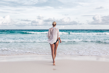 Image showing Woman on summer vacations at tropical beach of Mahe Island, Seychelles.