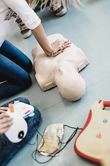 Image showing First aid resuscitation course using AED.