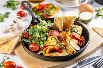 Image showing Omelet served with salad