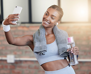 Image showing Woman, fitness and smile for selfie or profile picture in exercise, workout or training at the gym. Happy female smiling with water bottle for photo, memory or social media post in healthy wellness