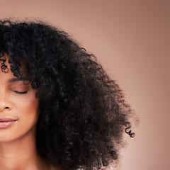 Image showing Half face, black woman or afro hair on studio background for product placement, curly mockup or skincare treatment management. Beauty model, natural or hairstyle with makeup on isolated wall mock up