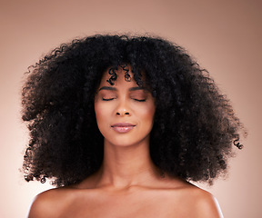 Image showing Natural hair, black woman with afro and face, haircare and skincare for beauty on studio background. Female, cosmetic treatment and curly hairstyle, calm and content with texture and facial skin glow